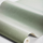 Фото рулона обоев "Forest Linen"с детализацией фактурного рисунка под ткань льна в приглушенно зеленых тонах производства фабрики Borastapeter