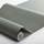 Рулон флизелиновых однотонных обоев Shades  Malachite артикул 6107 из каталога Shades фабрики Borastapeter с детализацией узора под камень малахит серовато зеленого цвета.