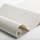 Рулон флизелиновых однотонных обоев Canvas Ivory артикул 6116 из каталога Shades фабрики Borastapeter с детализацией фактурного узора под ткань цвета слоновой кости.