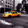 Фотообои Rush hour, Mr Perswall с изображением ярко-желтого такси на фоне черно-белого городского пейзажа. Фотообои для стен в наличии и на заказ в салонах ОДизайн, большой ассортимент.