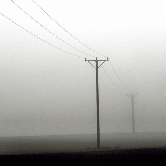 Фотообои арт. DM312-1 Mr. Perswall в черно-белых тонах с изображением перспективы из столбов электропередач окутанных густым туманом. Купить фотообои  Mr. Perswall в Москве, большой ассортимент, оплата онлайн, бесплатная доставка