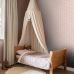 Розовые флизелиновые обои с ромашками для детской Daisies pink арт. 131113 в интерьере комнаты — уютный и игривый узор для стен.