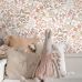 Флизелиновые обои для игровой Flowers and birds terracotta, taupe and pink арт. 131391 — с цветами и птицами в тёплых тонах — терракотовом, темно-сером и розовом создают в игровой комнате жизнерадостную и уютную атмосферу.