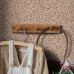 Флизелиновые обои для коридора Flowers terracotta pink арт. 131394 — с мелкими цветами в тёплых тонах — терракотово-розовом создают в комнате жизнерадостную и уютную атмосферу.