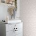 Флизелиновые обои детской Flowers lilac pink арт. 139531 из каталога POM POM PIE от Esta Home с нежными сиренево-розовыми цветами.