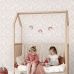 Детские обои для девочки Flowers lilac pink арт. 139531 из каталога POM POM PIE от Esta Home с нежными сиренево-розовыми цветами.
