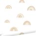 Детские обои для стен Rainbows beige and white арт. 139684  с радугами на белом фоне для уютной детской комнаты из каталога POM POM PIE от Esta Home (Нидерланды).
