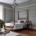 Английский интерьер спальни декорированной серыми цветочными обоями  Wandle из каталога Compilation Wallpaper от бренда Morris & Co