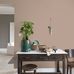 Фрагмент интерьера гостиной на фоне обоев Shades 4630 от Borastapeter припыленного розового цвета с геометрическим рисунком похожим на рыбью чешую. Выбрать, заказать обои для кабинета в интернет-магазине, бесплатная доставка.