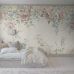 Интерьер спальни декорированный крупным панно на стену Flower Garden Mural артикул 6944 из каталога Newbie Wallpaper II от Borastapeter с ботаническим акварельным узором садовых цветов.