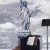 Фотообои  "Liberty Enlightening the World"  art P031901-4 фабрики Mr Perswall Швеция с изображением статуи свободы в серых  оттенках в интерьере гостиной