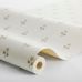 Рулон флизелиновых обоев Anemone White Heat артикул 6973 из каталога Osterlen от Borastapeter с мелким ретро узором розовых цветов анемона в стиле прованс на молочном фоне.