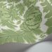 Обои арт. 94/9050 в рулоне. Растительный орнамент из цветов и листьев зеленого цвета на белом фоне, складывается в пышный дамаск крупного размера. Обои для квартиры, обои на стену, дизайнерские обои.
