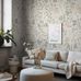 Цифровое панно для гостиной Trädgårdsfröjd Grand Beige, арт. 9787W от Borastapeter, дельфиниумы и жимолость на светло-бежевом фоне окрашены в лиственно-зеленый, абрикосово-розовый и белый цвета. Эти цветочные обои идеально подойдут для детской, спальни, кухни или прихожей, создавая романтичную атмосферу. Заказать их можно в интернет-магазине ODesign с бесплатной доставкой по всей России.