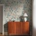 Цифровое панно для прихожей Trädgårdsfröjd Grand Natural, арт. 9788W от Borastapeter, завитки жимолости и дельфиниума нарисованы под впечатлением от Даларны, а сами обои выполнены в традиционных народных цветах: приглушенных оттенках красного, синего и лиственно-зеленого на бежевом фоне. Эти крупноформатные цветочные обои идеально подойдут для детской, спальни, кухни или прихожей, создавая романтичную атмосферу. Заказать их можно в интернет-магазине ODesign с бесплатной доставкой по всей России.