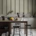 Цифровое панно для кухни Stockholm Stripe Green, арт. 9791W от Borastapeter, классические полосатые обои в увеличенном масштабе. Полосы разной ширины четырех разных оттенков придают строгому ритму узора живость и представлены в различных оттенках антично-зеленого и кремово-белого, подчеркнутые узкой терракотовой полосой. Эти полосатые обои идеально подойдут для детской, спальни, кухни или прихожей, создавая динамичную атмосферу. Заказать их можно в интернет-магазине ODesign с бесплатной доставкой по всей России.