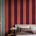 Цифровое панно для спальни Bjärö Stripe Orange&Bordeaux, арт. 9798W от Borastapeter, — это смелые графические обои с широкими полосами — классика с изюминкой в приглушенном кирпично-красном и насыщенным бордовым — элегантная, сдержанная цветовая палитра. Эти полосатые обои идеально подойдут для детской, спальни, кухни или прихожей, создавая динамичную атмосферу. Заказать их можно в интернет-магазине ODesign с бесплатной доставкой по всей России.