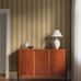 Цифровое панно для прихожей Bjärö Stripe Yellow&Beige, арт. 9799W от Borastapeter, — это смелые графические обои с широкими полосами — классика с изюминкой в насыщенном солнечно-желтом и приглушенном маслянисто-желтом — элегантная, сдержанная цветовая палитра. Эти полосатые обои идеально подойдут для детской, спальни, кухни или прихожей, создавая динамичную атмосферу. Заказать их можно в интернет-магазине ODesign с бесплатной доставкой по всей России.