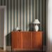 Цифровое панно для прихожей Båstad Stripe Blue&Beige, арт. 9800W от Borastapeter, — полосатые обои представлены в мягкой цветовой гамме с полосами цвета морской волны и бежевого. Эти классические обои идеально подойдут для детской, спальни, кухни или прихожей, создавая динамичную атмосферу. Заказать их можно в интернет-магазине ODesign с бесплатной доставкой по всей России.