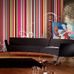 Фотообои art P030901-8 Флизелин Mr Perswall Швеция с яркими разноцветными полосами в интерьере гостиной
