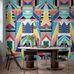Интерьер гостиной с потрясающим многоцветным фотопанно Bright Side - Happy, Mr Perswall с орнаментом, вдохновленным африканским искусством. Купить фотопанно для стен в салонах ОДизайн, бесплатная доставка.