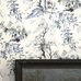 Фрагмент обоев на стене арт. PDG651/03  из коллекции Shanghai Garden от Designers Guild, Великобритания с изображением  пейзажа  в стиле китайских гравюр в черно-синих тонах на белом фоне, с оплатой онлайн