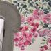 Фрагмент интерьера с фотопанно арт. PDG656/01  из коллекции Shanghai Garden от Designers Guild, Великобритания с изображением бордюра с цветочным рисунком на фоне с эффектом градиентной растяжки в ярко розовом цвете, на складе в Москве
