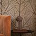 Панно KORGPIL для гостиной из коллекции Scandinavian Designers III от Borastapeter с пышным растительным рисунком, из растущих рябин с розовыми цветами на коричневом фоне, с оплатой картой в магазине
