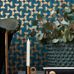 Флизелиновые обои из Швеции коллекция Scandinavian Designers II от Borastapeter, с рисунком под названием Vertigo. Двухцветный геометрический рисунок выполненный в темно-бирюзовом  цвете с добавлением металлика золотого оттенка на темном синем фоне. Обои для гостиной, для коридора. Большой ассортимент, бесплатная доставка, онлайн оплата