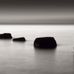 Фотообои арт. DM311-2 Mr. Perswall в черно-белых тонах с изображением минималистичного пейзажа из камней окруженных водной гладью. Купить фотообои  Mr. Perswall в Москве, большой ассортимент, оплата онлайн, бесплатная доставка