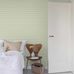 Обои Esther от ECO Wallpaper оливкового цвета в интерьере спальни. Выбрать, заказать шведские обои для комнаты в интернет-магазине.